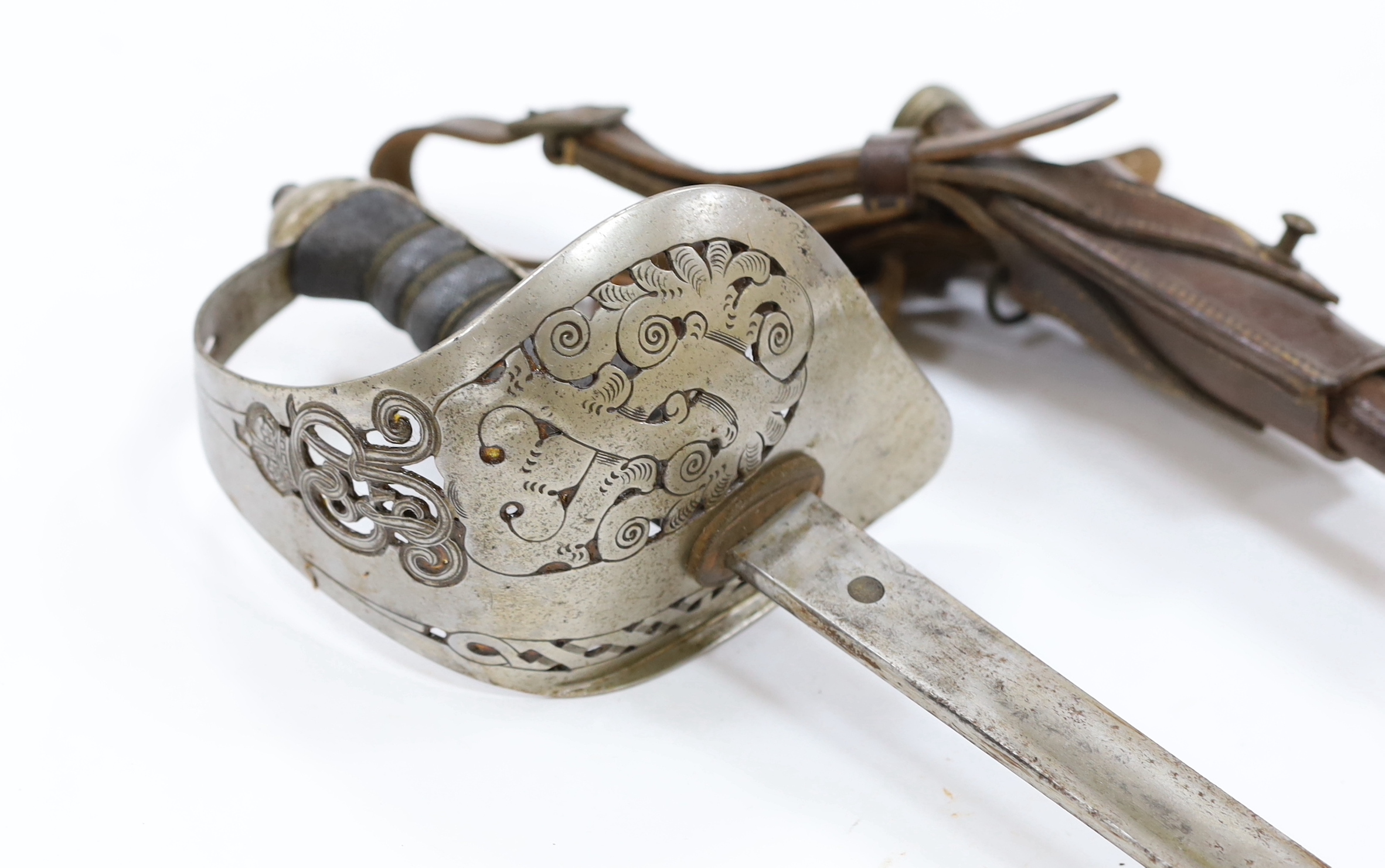 A George V 1897 pattern infantry officer's sword, with scabbard and leather hanger, blade 82cm